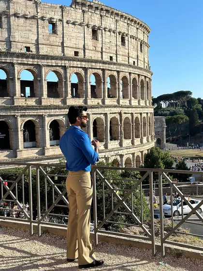 Our Viaggio shirt in a brilliant royal blue, seen here against the magnificent Colosseum in Rome. It's the ultimate travel shirt for the stylish explorer.