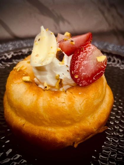 Baba au Rhum, a classic French dessert. It's a small yeast cake saturated in rum syrup, a specialty from our international recipe class.