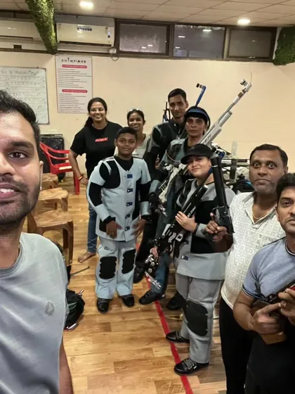 A selfie with some of the members of Team Champion's. This is the dedicated group of shooters and coaches that make our community special.