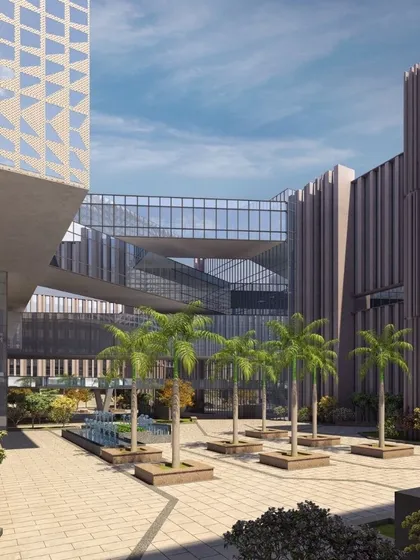 This courtyard at a university in Mohali demonstrates how we integrate green spaces within a dense architectural footprint. The interconnected bridges and walkways create dynamic visual links and physical pathways between buildings, fostering a sense of a unified campus.