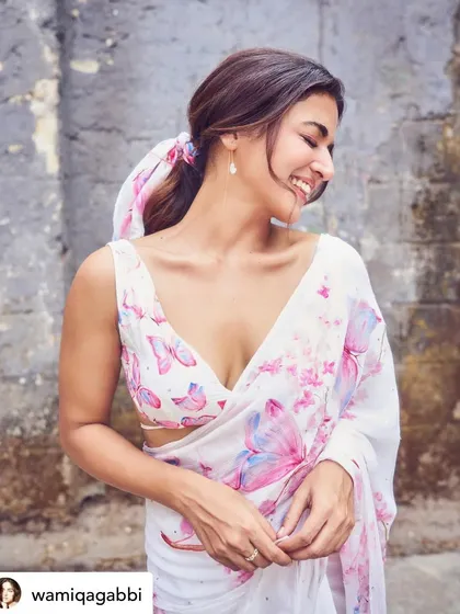 Wamiqa Gabbi smiling in my butterfly earrings. They are a reminder to move through life with grace.