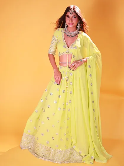 A confident, full-length portrait. The direct-to-camera gaze and strong pose make this a very engaging image.