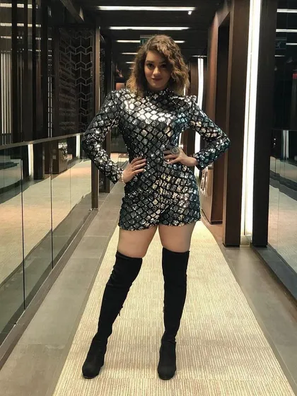 All set for the show in my signature sequin outfit and boots. A powerful stage presence is not just about the voice, it's about the complete performance.