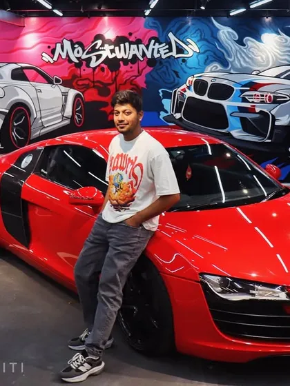 Bringing the heat to this Ahmedabad showroom with a 'Most Wanted' themed mural. This piece features a custom Nissan GTR and BMW M2, hand-painted to match the high-energy vibe of the space and the supercars it houses.