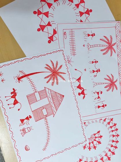 A flat lay of several Warli compositions you'll learn to create. This shows the variety of scenes, from village life with palm trees to the classic circular dance.