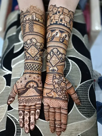 This design features a procession of elephants and a palace scene, combined with geometric patterns and a large peacock on the palm.
