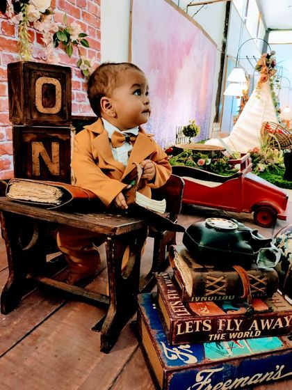 A gallery of our popular school and library theme. These images show the versatility of the brick wall backdrop, mini school desk, globe, and book props for creating a variety of scholarly and classic portraits.