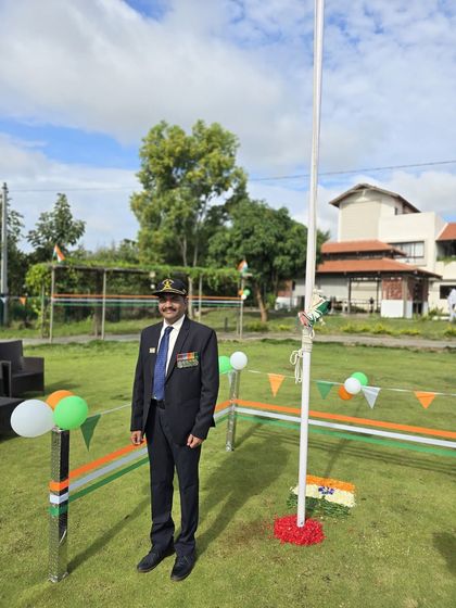 Our security head, Mr. Ramesan Kudajadri, a Kargil war veteran, stands proudly by the flag on Independence Day. Heroes don't retire; they just change their battlefield. We salute him.