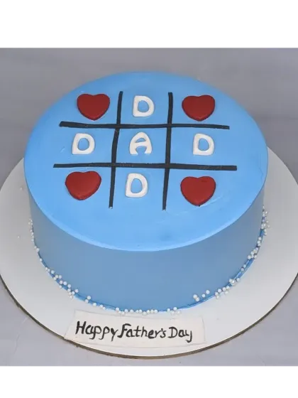 A Father's Day cake with a fun tic-tac-toe design. This is a chocolate truffle cake, showing that Dad always wins.