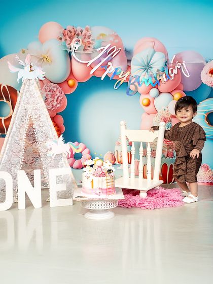 A different look for the birthday boy. This photo shows the versatility of my birthday setups, easily customized for any child to celebrate their big day in style.