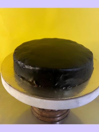 This is my classic chocolate truffle cake, a true symphony of rich cocoa. With its velvety texture and deep, decadent layers, every slice is an unforgettable experience for any chocolate lover.