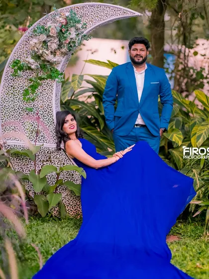 A stylish portrait with a crescent moon prop in the garden, perfect for a unique and dreamy shoot.