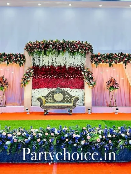 This is a full view of the grand reception stage, including the photography and lighting equipment. This shows how our stages are designed to be perfectly lit for photos and videos, ensuring your memories are captured beautifully.