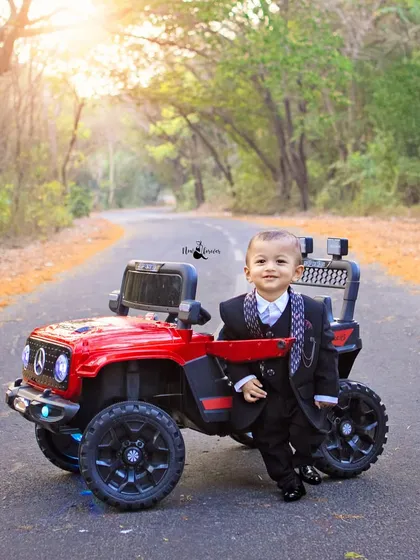 Turning one in style. For a different take on birthday shoots, we offer themed outdoor sessions like this one, featuring a dapper little man and his very own ride against a beautiful, sunlit backdrop.
