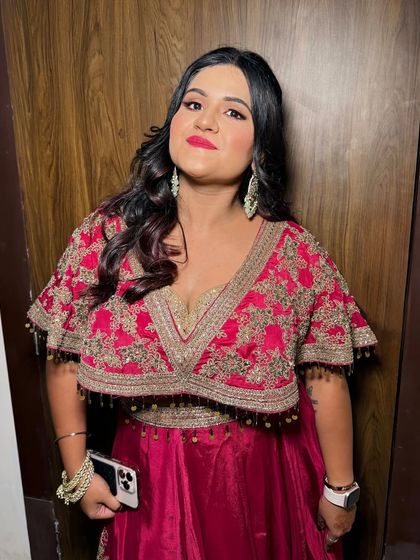 The client looking glamorous and confident.