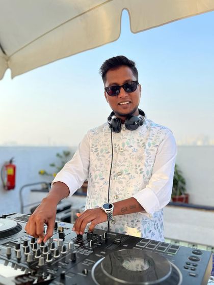 A rooftop Baraat event at Marine Plaza, Mumbai. The open air and bright sunshine create a fantastic atmosphere for a daytime celebration.