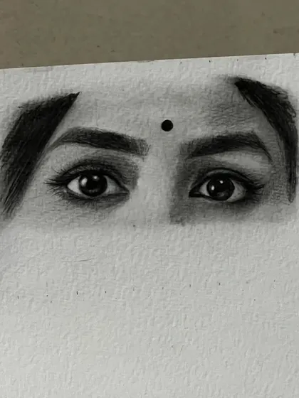 Another close up of the eyes from the Mrunal Thakur sketch, showing the detailed pencil work used to create a realistic and expressive look.