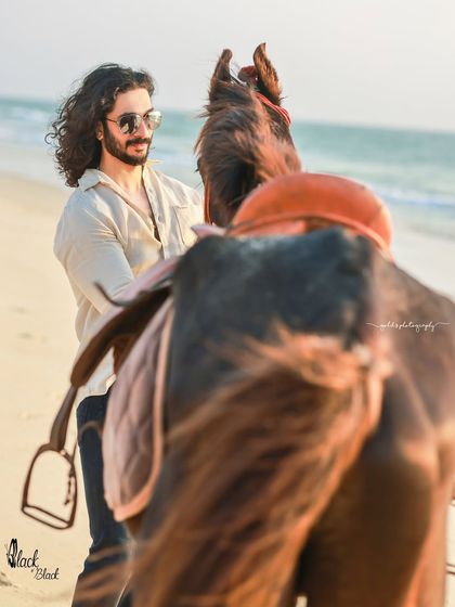 An extensive editorial series of a male model with a horse on the beach. I used a mix of color and black and white, along with varied poses, to create a powerful narrative of untamed strength and freedom.