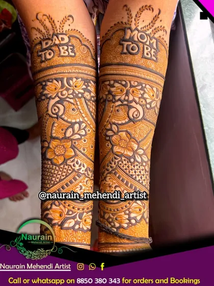 A unique baby shower design on the legs, featuring "Dad to be" and "Mom to be" lettering. It's a fun and personal way to celebrate the parents.
