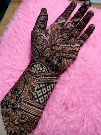An intricate design that combines floral elements with bold geometric patterns, perfect for a bride who loves both styles.