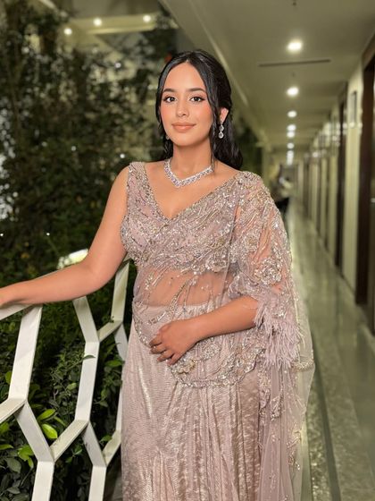 The full look. The soft, glowing makeup and elegant hairstyle are perfect for an evening engagement or reception.