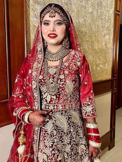 Our beautiful bride Sana, ready for her Nikah. We created a balanced look with shimmery eyes, a perfect red lip, and an HD base that looks like real skin.