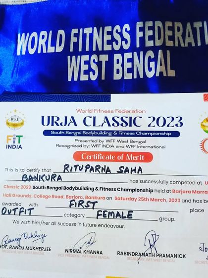 A close-up of my certificate of merit for placing first in the female outfit category at the Urja Classic 2023, a South Bengal Bodybuilding & Fitness Championship.