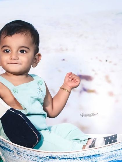 Explore our full nautical and beach-themed collection. These images showcase the variety of poses and angles possible with our boat prop, sand-colored flooring, and ocean backdrop.