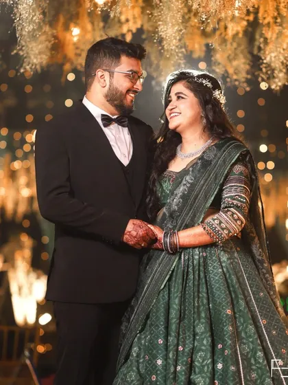 The look of love. This portrait of Nidhi and Himanshu is all about the shared glance and gentle smiles. It’s a perfect example of a natural, comfortable portrait amidst the wedding festivities.