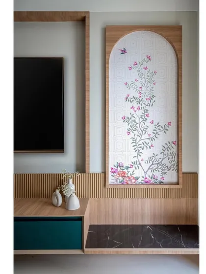 A close-up of the delicate, hand-painted floral artwork that adds a touch of grace and beauty to the TV wall.