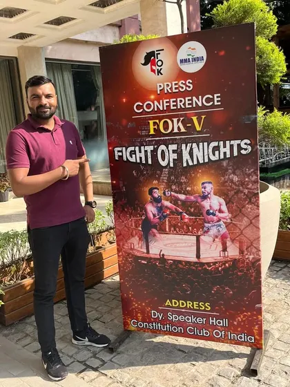 Posing with the banner for the FOK-V press conference.