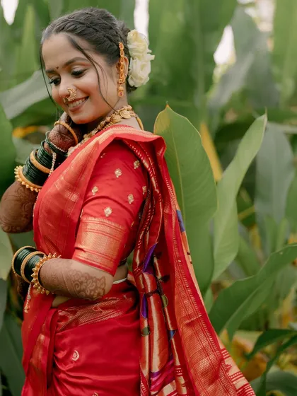 A close-up of the bride's shy smile and glowing skin.