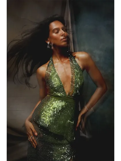 A shimmering green halter-neck gown from Ambika Lal. I used motion blur and soft lighting to create a dreamy, ethereal effect that highlights the sparkle of the fabric.