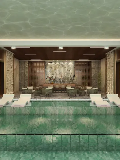 Another view of the Ceejay Residency pool, where you can unwind in style, surrounded by calming landscapes that echo the grandeur of natural beauty. The design celebrates the fusion of natural repose with architectural brilliance.