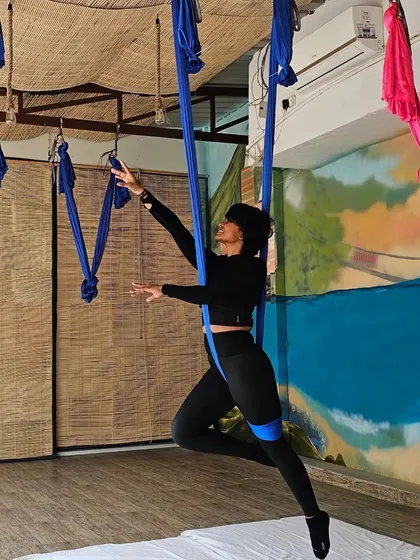 I truly believe that when walking becomes a struggle, you can learn to fly. Here I am in my element during my Aerial Yoga teacher training. This practice was my gateway to moving freely after my injuries, using the silk to support my body and build strength without impact.