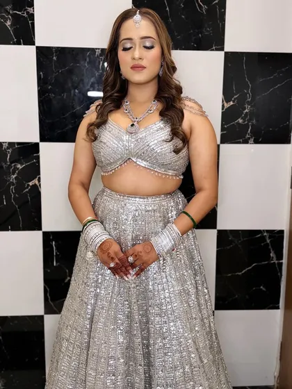 A close-up of the soft glam makeup for this silver lehenga look. I created a subtle smokey eye with a nude lip to let the outfit shine.