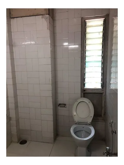 This is what the bathroom looked like before the renovation. By redesigning the layout and updating all the materials and fixtures, we were able to completely transform it into a modern and luxurious space.