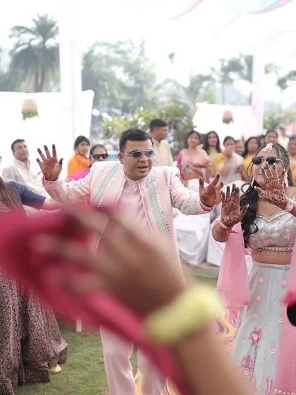 Waving red handkerchiefs during a dance sequence. Using simple props can make group dances more colorful and coordinated.