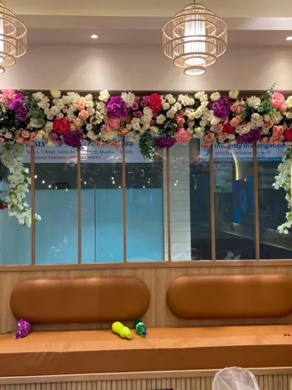 Another angle of the floral decor inside the Zorko Cafe, showing how it enhances the seating area. These installations are designed to complement your existing interior design.