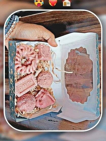 A beautiful gift hamper created using one of my decorative boxes, filled with assorted pink soaps and shredded paper.