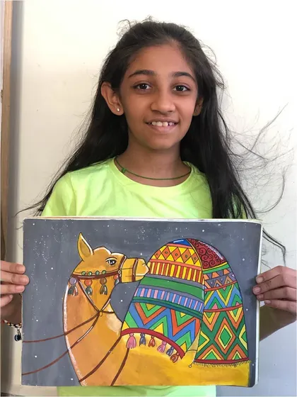 The student who painted the beautiful Rajasthani camel. Her work shows great attention to detail and a love for vibrant cultural art.