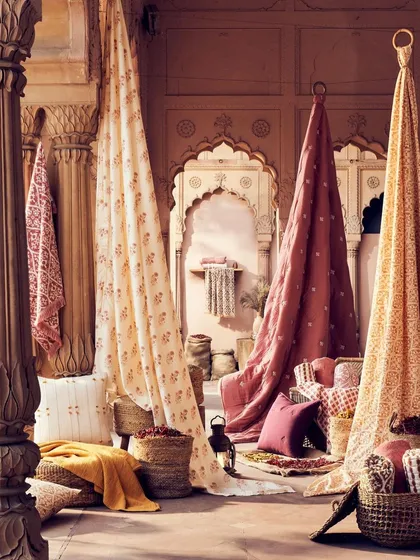 For this 'Spice Market' collection, we built a vibrant, layered world inspired by Indian bazaars. This shot demonstrates our team's skill in complex set styling, arranging dozens of products like fabrics, pillows, and baskets into a single, cohesive, and commercially powerful image.
