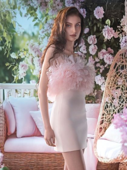 A different angle of the projected floral balcony scene, showing the versatility of a single virtual set. By changing the camera position, we can create multiple unique shots from one setup.