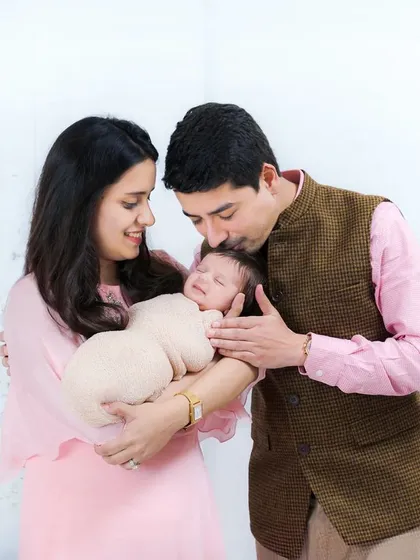 Welcoming a newborn is a chapter filled with overwhelming love. I focus on capturing that tender connection, like a father's gentle kiss, in a comfortable and relaxed at-home session.