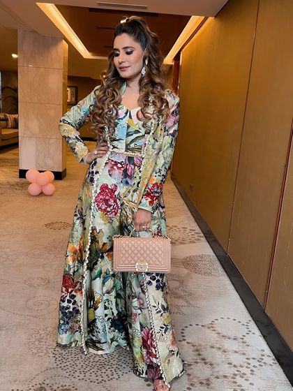 A simple and elegant look for a client's daughter's first birthday, featuring a floral Varun Bahl outfit.