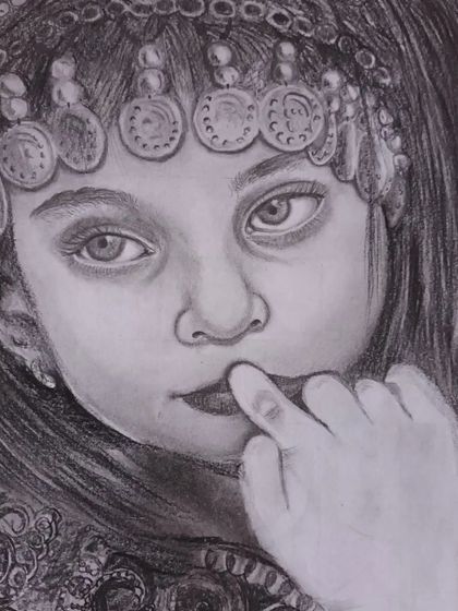 An expressive charcoal portrait of a young girl with a traditional headpiece. This drawing focuses on capturing the innocence and curiosity in her eyes.