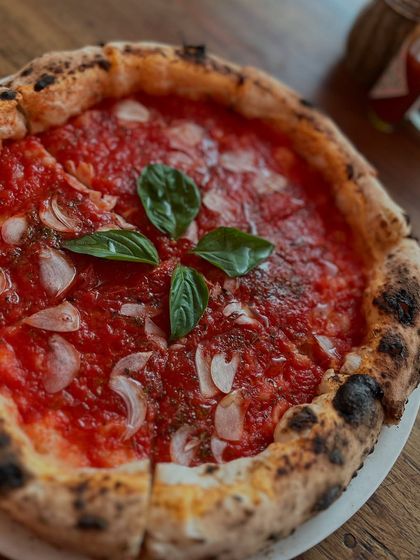 No cheese, no fuss, just pure, saucy perfection. Our Marinara pizza is a testament to the power of simple, high-quality ingredients.