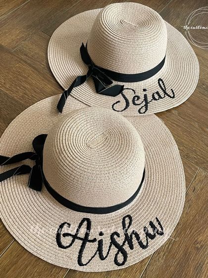 Throwing shade and catching waves in our customized beach hats. These wide-brimmed straw hats are perfect for a bachelorette party or girls' trip, each personalized with a name.