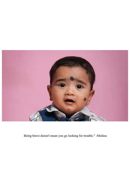 A tender close-up of a baby boy with a thoughtful expression. The simple pink background and the quote from 'The Lion King' add a sweet, narrative element to the portrait.