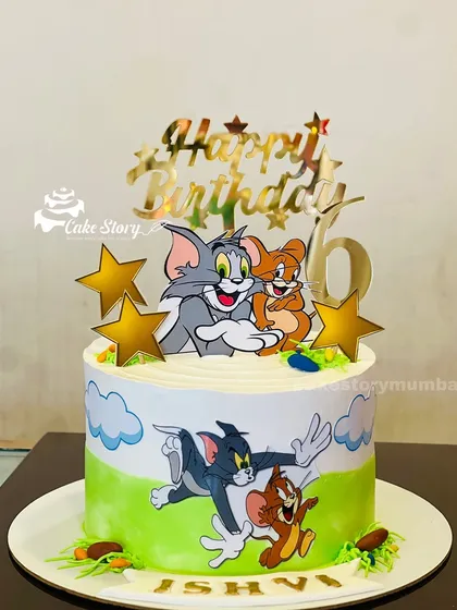 A classic Tom and Jerry theme cake. This design captures the fun and chaos of the beloved cartoon duo, perfect for a 6th birthday celebration.